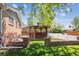 Backyard view of gazebo with stone pillar decor, adding character and outdoor living space at 1522 Utah St, Golden, CO 80401