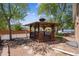 Backyard featuring a charming wooden gazebo with a seating area, perfect for outdoor relaxation at 1522 Utah St, Golden, CO 80401