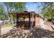 Backyard featuring a cozy wooden gazebo with lattice details, providing a shaded retreat at 1522 Utah St, Golden, CO 80401