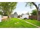 Spacious backyard offers a serene escape with a fire pit and ample room for outdoor enjoyment at 4406 S Delaware St, Englewood, CO 80110