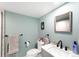 Stylish bathroom features modern fixtures, a sleek vanity, and a soothing color palette at 4406 S Delaware St, Englewood, CO 80110