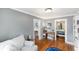 Cozy living area showcasing hardwood floors and easy access to other rooms at 4406 S Delaware St, Englewood, CO 80110