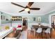 Inviting living and dining room with hardwood floors, and stylish decor at 4406 S Delaware St, Englewood, CO 80110