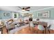 Inviting living and dining room with hardwood floors, and stylish decor at 4406 S Delaware St, Englewood, CO 80110