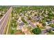 Scenic aerial view showcases the neighborhood's lush greenery and convenient access to major roads at 701 Tucson, Aurora, CO 80011