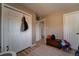 Neutral bedroom featuring ample closet space and a wood-style floor at 701 Tucson, Aurora, CO 80011