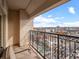 Balcony with wrought iron railing overlooking city streets and skyline, offering ample outdoor space at 925 N Lincoln St # 12G, Denver, CO 80203
