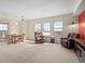 Cozy living room with large windows and comfortable seating area at 925 N Lincoln St # 12G, Denver, CO 80203