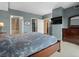 Spacious main bedroom featuring an ensuite bathroom, large bed, and generous closet space at 925 N Lincoln St # 12G, Denver, CO 80203