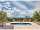 Rooftop pool with skyline views surrounded by foliage and seating at 925 N Lincoln St # 12G, Denver, CO 80203