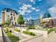 Stunning rooftop deck with elegant landscaping and city views with an ornate dome at 925 N Lincoln St # 12G, Denver, CO 80203