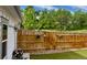 Wooden backyard fence with floral accents, providing privacy and charm at 5404 W 95Th Pl, Westminster, CO 80020
