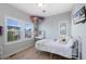 Cozy bedroom with white walls, lots of light, and white shutters at 5404 W 95Th Pl, Westminster, CO 80020