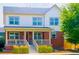 Charming two-story home with a inviting brick porch and well-maintained lawn at 5404 W 95Th Pl, Westminster, CO 80020