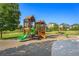 Community playground with colorful play structures, swings, and slides for enjoyment at 5404 W 95Th Pl, Westminster, CO 80020
