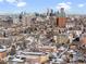 Extensive city view of Denver, with various buildings in the foreground and downtown skyline in the background at 148 S Emerson St # 206, Denver, CO 80209