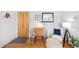 Cozy entryway with desk, chair, mirror, and decor, perfect for a small home office at 148 S Emerson St # 206, Denver, CO 80209