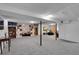 Large finished basement with carpet and multiple rooms at 435 Cody Dr, Lakewood, CO 80226