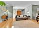 Comfortable living room with a gray couch, hardwood floors, and neutral paint colors at 435 Cody Dr, Lakewood, CO 80226