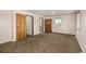 Bedroom with hardwood-look flooring, closet, and plenty of natural light at 3525 S Brentwood St, Lakewood, CO 80235