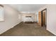 Bedroom with plush carpet, natural light, and a comfortable bed at 3525 S Brentwood St, Lakewood, CO 80235