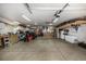 Spacious garage includes ample storage, overhead lighting, and a concrete floor at 3525 S Brentwood St, Lakewood, CO 80235