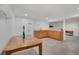 Basement area featuring a kitchenette with natural wood cabinets at 7266 S Birch St, Centennial, CO 80122