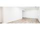 Spacious basement featuring laminate flooring and great natural light from the window at 13812 W 64Th Pl, Arvada, CO 80004