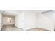 Finished basement with wood floors, white walls, and a window for natural light at 13812 W 64Th Pl, Arvada, CO 80004
