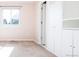 Bedroom with carpet, one window, and built in storage closets and shelves at 13812 W 64Th Pl, Arvada, CO 80004