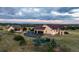 Aerial view of a home with playground, lush landscape and detached building on expansive property at 8456 N Sundown Trl, Parker, CO 80134
