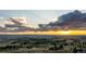 Beautiful home at sunset sits on top of a hill with incredible, expansive views in all directions at 8456 N Sundown Trl, Parker, CO 80134