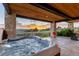 Enjoy the evening in this luxurious outdoor hot tub on a private patio with stunning views at 8456 N Sundown Trl, Parker, CO 80134