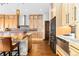 Modern kitchen featuring custom cabinets, stainless steel appliances, and a beautiful island with seating at 8456 N Sundown Trl, Parker, CO 80134