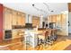 Spacious kitchen with bar seating, modern appliances, and ample cabinet space at 8456 N Sundown Trl, Parker, CO 80134