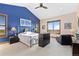 Bright bedroom with vaulted ceiling, neutral carpet, and picturesque windows at 8456 N Sundown Trl, Parker, CO 80134