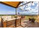 Spacious outdoor living area features comfortable seating and stunning panoramic views of the countryside at 8456 N Sundown Trl, Parker, CO 80134