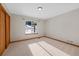 Bedroom with tan carpet and neutral walls at 87 Elmgreen Ln, Evergreen, CO 80439