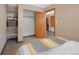 Bedroom view showcases closet space and an adjacent room, creating an open feel at 87 Elmgreen Ln, Evergreen, CO 80439