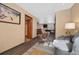 Hallway view shows open floor plan with kitchen access from sitting room at 87 Elmgreen Ln, Evergreen, CO 80439