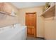 Functional laundry room with modern appliances and ample storage space at 87 Elmgreen Ln, Evergreen, CO 80439