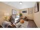 Comfortable living room with natural light, stylish decor and hardwood floors at 87 Elmgreen Ln, Evergreen, CO 80439