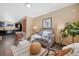Living room featuring an open floor plan to the kitchen, and hardwood floors at 87 Elmgreen Ln, Evergreen, CO 80439