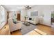 Bright living room featuring hardwood floors, neutral paint, and stylish decor at 87 Elmgreen Ln, Evergreen, CO 80439