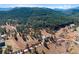 Gorgeous property lot surrounded by mature trees and beautiful mountain views at 87 Elmgreen Ln, Evergreen, CO 80439