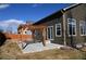 Backyard showing a wood pergola attached to the house, creating a shaded outdoor living space at 9121 Harlequin Cir, Frederick, CO 80504