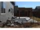 Backyard patio area with wood pergola at 9121 Harlequin Cir, Frederick, CO 80504