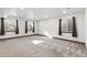Large finished basement is carpeted and features multiple windows for natural light at 9121 Harlequin Cir, Frederick, CO 80504
