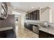 Kitchen with stainless steel appliances, granite countertops, and open to dining area at 9121 Harlequin Cir, Frederick, CO 80504