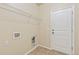 Functional laundry room with shelving, tiled flooring, and utility connections at 9121 Harlequin Cir, Frederick, CO 80504
